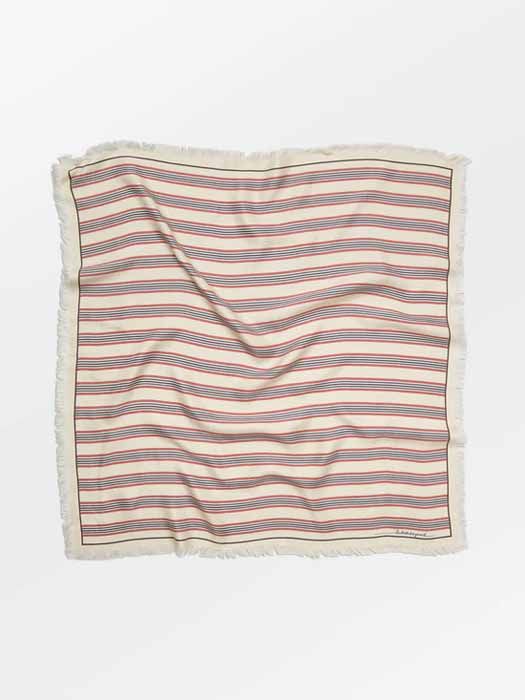 Foulard blanc à rayures rouges et bleues de la marque Becksöndergaard, disponible à Divonne-les-Bains.